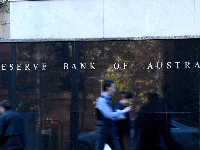 People walk past the Reserve Bank of Australia. Picture: AAP.