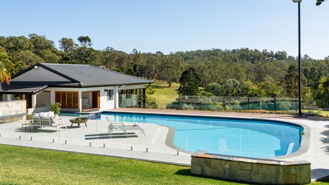 The pool and guest quarters at the property in Pullenvale. Image supplied by Ray White New Farm.