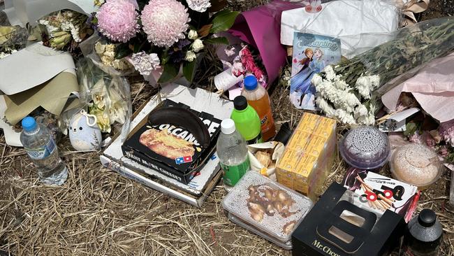 A roadside memorial for a Buckland Park teen killed in a crash in Adelaide's north has grown to several metres as loved ones continue to pay tribute. Picture: Natalie Vikhrov