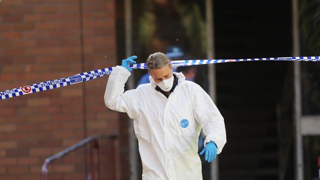 The crime scene in Hamilton South, Newcastle, where a man was shot dead at the front door of his apartment block on Tuesday night. Picture by Peter Lorimer.