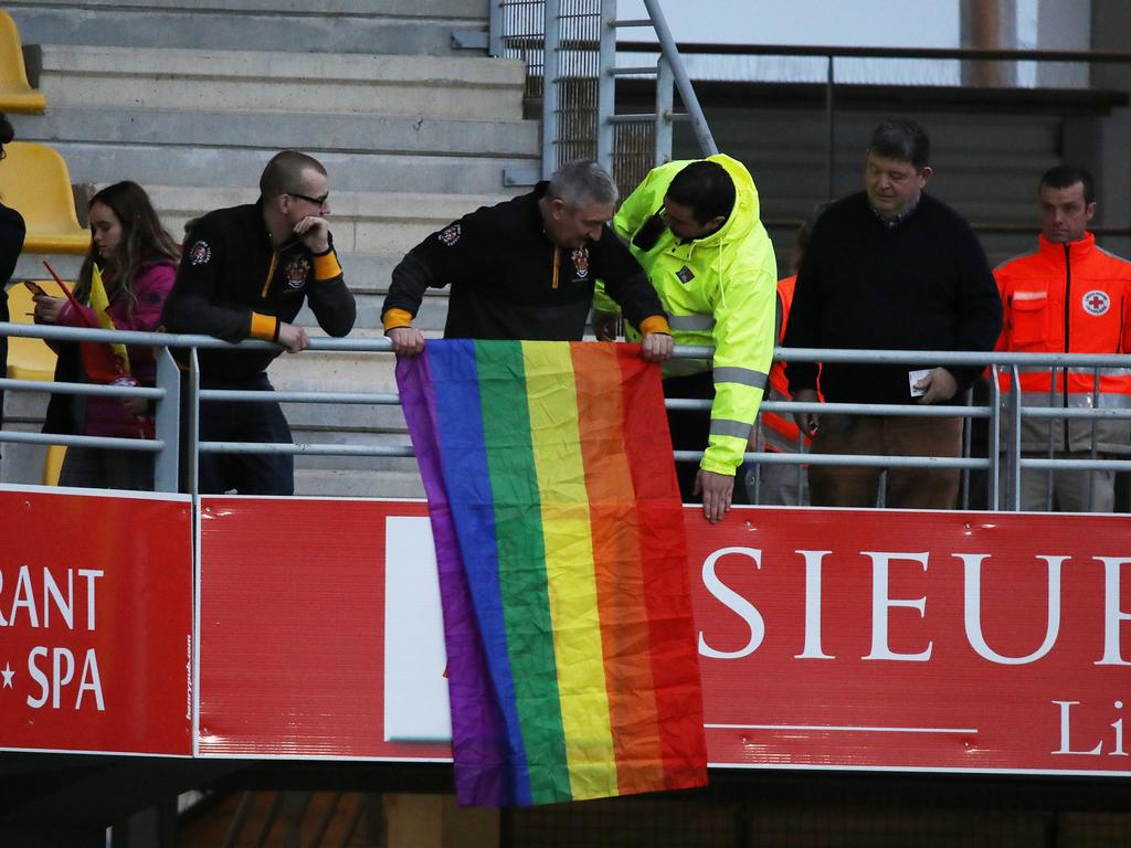 People were asked to remove a rainbow flag during Folau’s first Super League game.