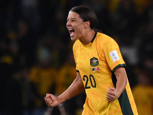 Australia's forward #20 Sam Kerr celebrates at the end of the Australia and New Zealand 2023 Women's World Cup round of 16 football match between Australia and Denmark at Stadium Australia in Sydney on August 7, 2023. (Photo by FRANCK FIFE / AFP)