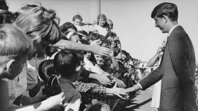 A young Prince Charles (now King Charles) meeting Gold Coast locals during his visit to Queensland in May 1966.