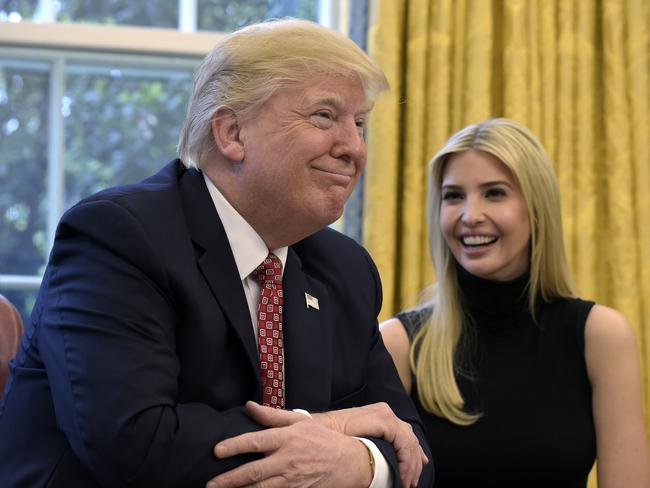 DAY 95 - In this April 24, 2017, file photo, President Donald Trump, accompanied by his daughter Ivanka Trump, talks via video conference with International Space Station Commander Peggy Whitson on the International Space Station from the Oval Office of the White House in Washington. (AP Photo/Susan Walsh, file)