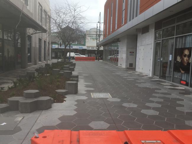 The laneway was planned to be a shared space for pedestrians and cars.