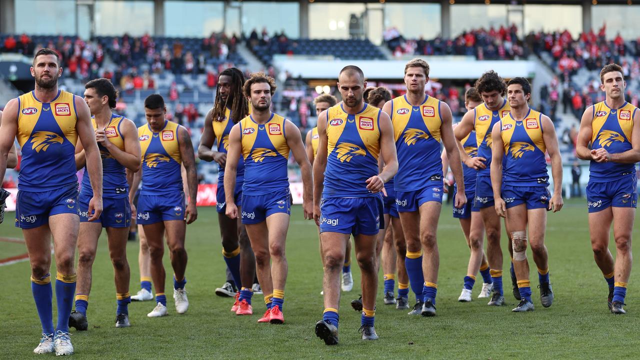GEELONG, AUSTRALIA - JULY 04: The Eagles walk off the ground after they were defeated by the Swans during the round 16 AFL match between Sydney Swans and West Coast Eagles at GMHBA Stadium on July 04, 2021 in Geelong, Australia. (Photo by Robert Cianflone/Getty Images)