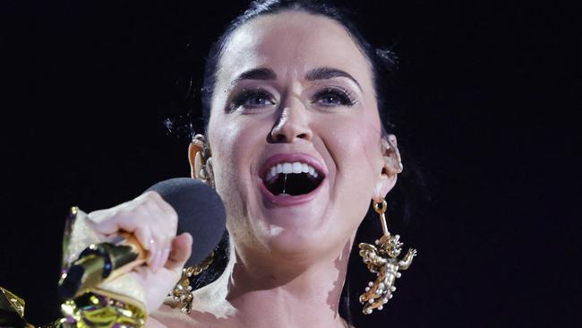 TOPSHOT - US artist Katy Perry performs inside Windsor Castle grounds at the Coronation Concert, in Windsor, west of London on May 7, 2023. - For the first time ever, the East Terrace of Windsor Castle will host a spectacular live concert that will also be seen in over 100 countries around the world. The event will be attended by 20,000 members of the public from across the UK. (Photo by Chris Jackson / POOL / AFP)