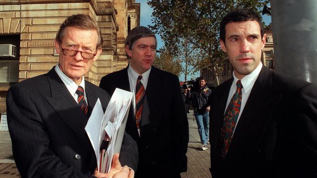 SA lawyer Michael Abbott, QC, with Peter Norman and Mark Griffin.