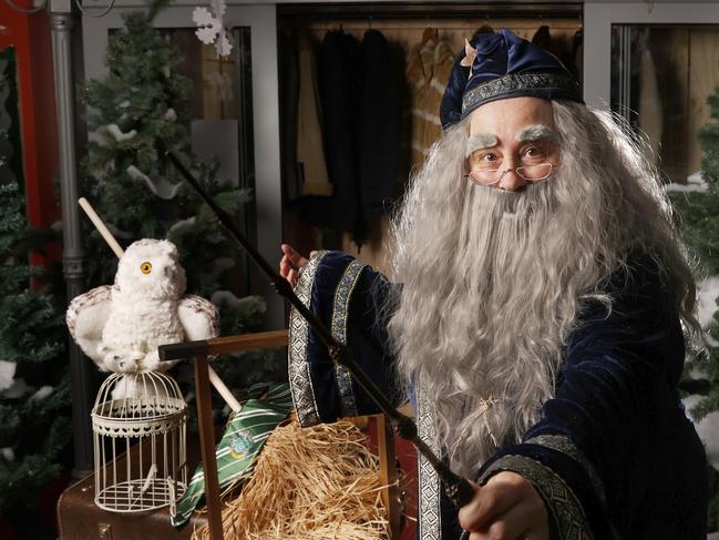 Teacher librarian Marylouise Jones at St Mary's College in Hobart has turned the school library into a Winter wonderland and is dressed as Dumbledore from Harry Potter for the whole of book week 2024.  Picture: Nikki Davis-Jones