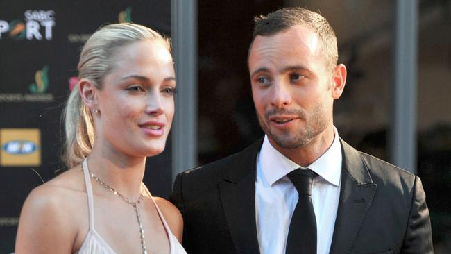 Former South African athlete Oscar Pistorius (right) with Reeva Steenkamp, whom he was jailed for murdering in 2016. Picture: AFP