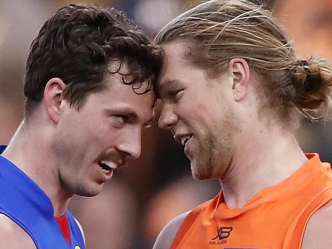 SYDNEY, AUSTRALIA - SEPTEMBER 07: Harry Himmelberg of the Giants remonstrates with Zaine Cordy of the Bulldogs during the 2019 AFL Second Elimination Final match between the GWS Giants and the Western Bulldogs at Giants Stadium on September 07, 2019 in Sydney, Australia. (Photo by Dylan Burns/AFL Photos via Getty Images)