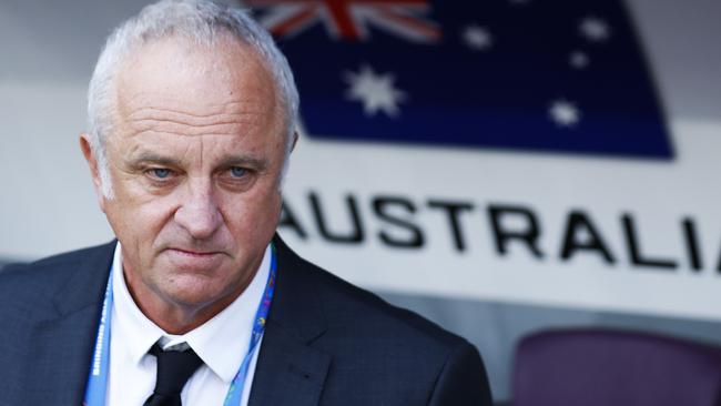 Graham Arnold has his hands full at the Asian Cup. (AP Photo/Hassan Ammar)