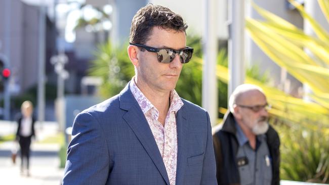 Mathew Low, husband of victim Cindy Low is seen arriving at the inquest into the Dreamworld disaster at the Southport Courthouse on the Gold Coast, Friday, June 22. (AAP Image/Glenn Hunt)