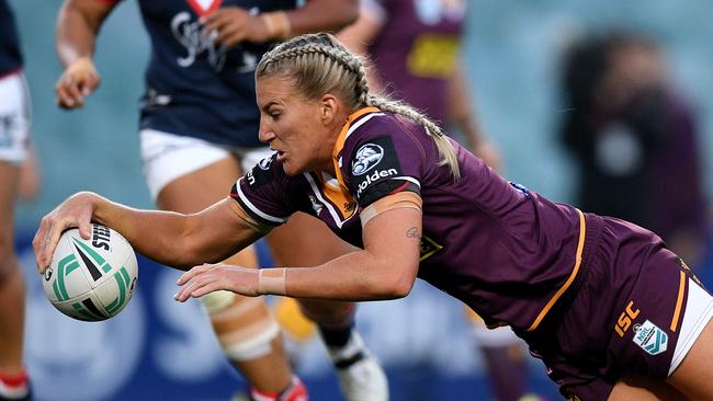 Ali Brigginshaw reaches out to score a try for the Broncos. Picture: AAP