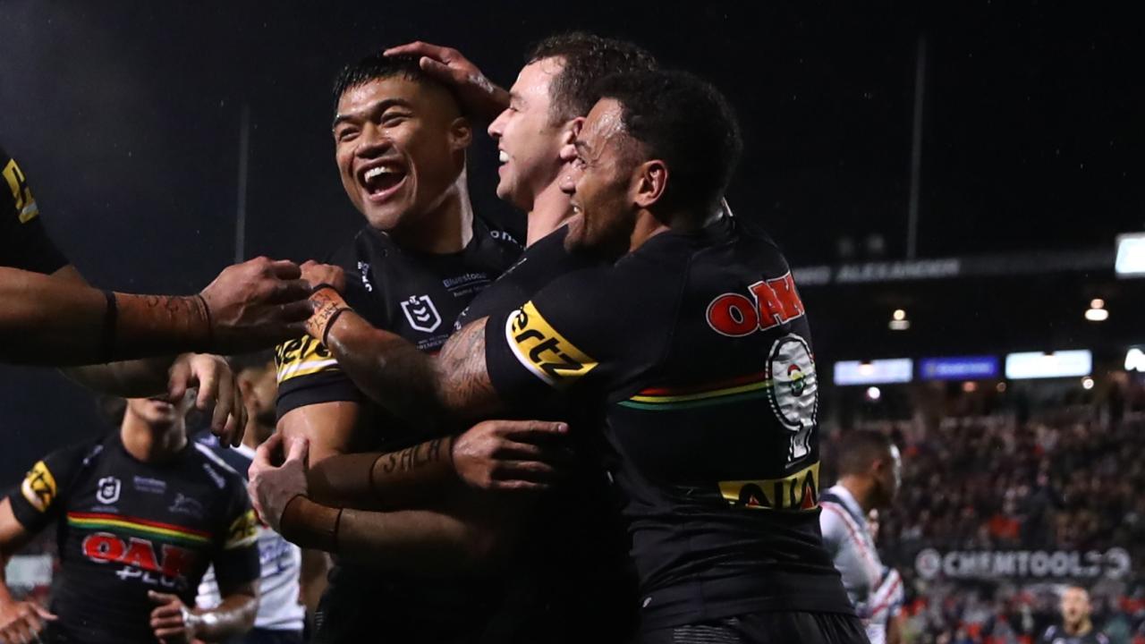 PENRITH, AUSTRALIA - JULY 01: Brian To'o of the Panthers celebrates with teammates after scoring a try during the round 16 NRL match between the Penrith Panthers and the Sydney Roosters at BlueBet Stadium on July 01, 2022 in Penrith, Australia. (Photo by Jason McCawley/Getty Images)