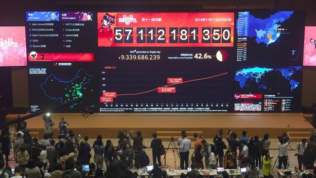 epa04485678 An electronic board shows the 11 November 2014 Singles' Day sales figure of more than 57.1-billion yuan (7.4 billion euro) generated by e-commerce giant Alibaba Group shopping sites, just minutes after midnight at Alibaba headquarters in Hangzhou, Zhejiang province, China, 12 November 2014. Singles' Day, which is often referred to as China's version for single people to celebrate on 11 November, sparks an online shopping frenzy among Chinese and overseas shoppers purchasing discounted goods. EPA/SHERWIN CHINA OUT