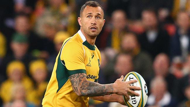 BRISBANE, AUSTRALIA - JULY 18: Quade Cooper of the Wallabies runs the ball during The Rugby Championship match between the Australian Wallabies and the South Africa Springboks at Suncorp Stadium on July 18, 2015 in Brisbane, Australia. (Photo by Cameron Spencer/Getty Images)