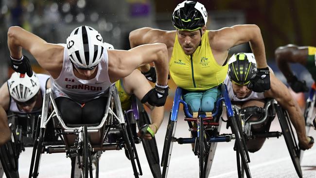 Kurt Fearnley of Australia (centre) during the Men's T54 1500m final.