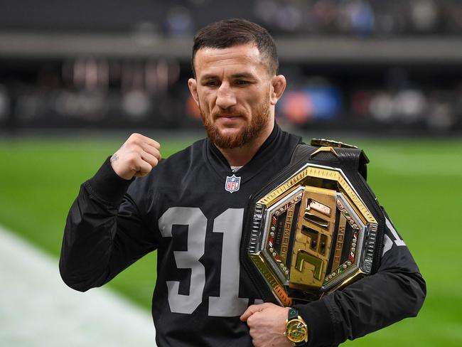 LAS VEGAS, NEVADA - JANUARY 05: UFC Fighter Merab Dvalishvili poses for a picture prior to the game between the Los Angeles Chargers and Las Vegas Raiders at Allegiant Stadium on January 05, 2025 in Las Vegas, Nevada.   Candice Ward/Getty Images/AFP (Photo by Candice Ward / GETTY IMAGES NORTH AMERICA / Getty Images via AFP)