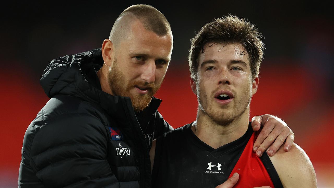 Essendon skipper Dyson Heppell with Zach Merrett. Picture: Michael Klein