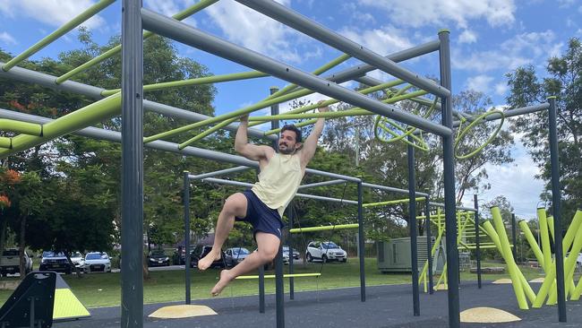 Cr Ryan Bayldon-Lumsden trying out a Ninja Warrior course at Guyatt Park in Brisbane.