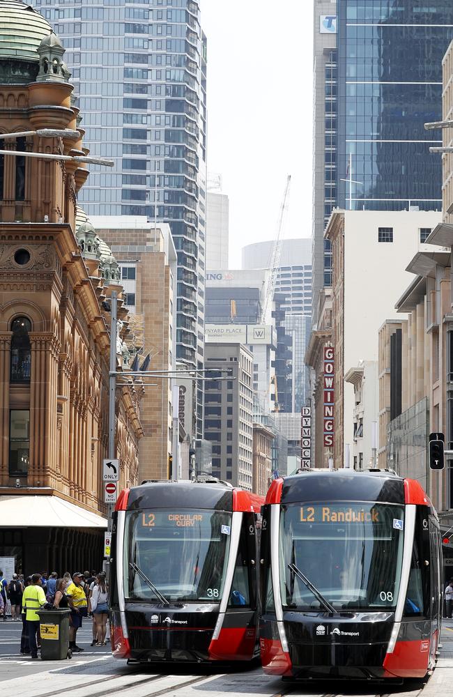 Trams gliding leisurely along George Street towards Randwick. Picture: Lisa Maree Williams/Getty Images.