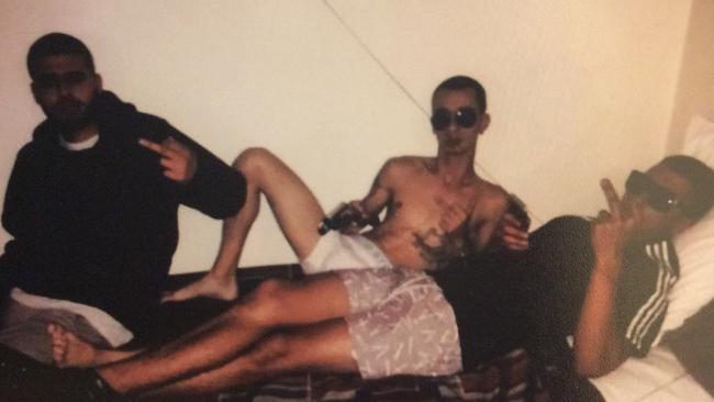 Albert Rapovski (centre) with Mahamd Hassan (R) and another friend (L). Picture: Courts