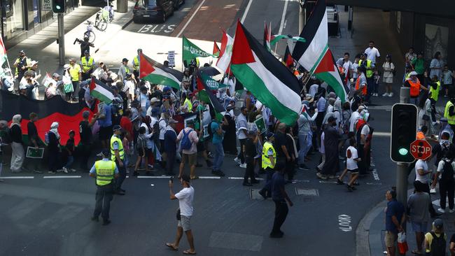 The Stop The Genocide in Gaza Free Palestine protest making it’s way through the Sydney CBD back to Hyde Park. Picture: Jonathan Ng