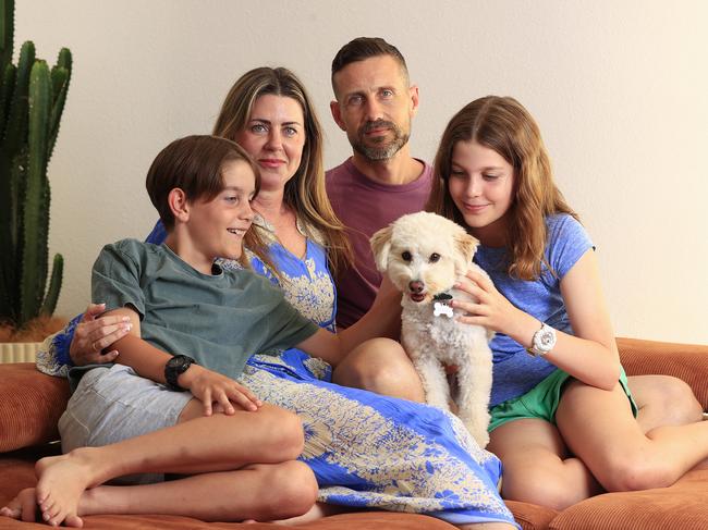 Louisa and Jon Hollenberg with their kids Annelise and Jahn and their dog Maisie. Picture: Adam Head.