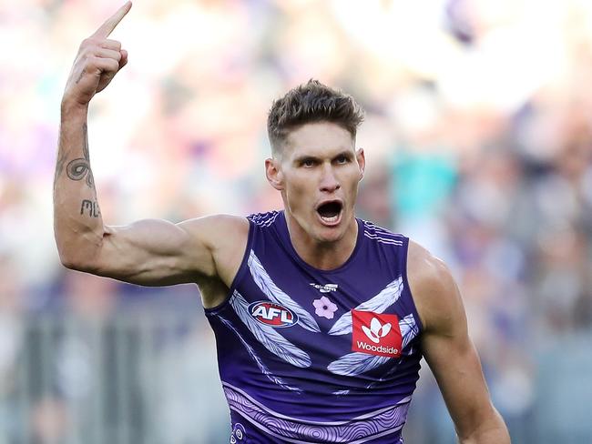 PERTH, AUSTRALIA - JULY 03: Rory Lobb of the Dockers celebrates after scoring a goal during the 2022 AFL Round 16 match between the Fremantle Dockers and the Port Adelaide Power at Optus Stadium on July 03, 2022 in Perth, Australia. (Photo by Will Russell/AFL Photos via Getty Images)