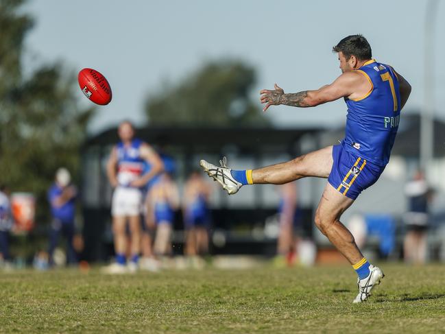 Cranbourne champion Marc Holt slots a goal at the Eagles’ new ground. Picture: Valeriu Campan