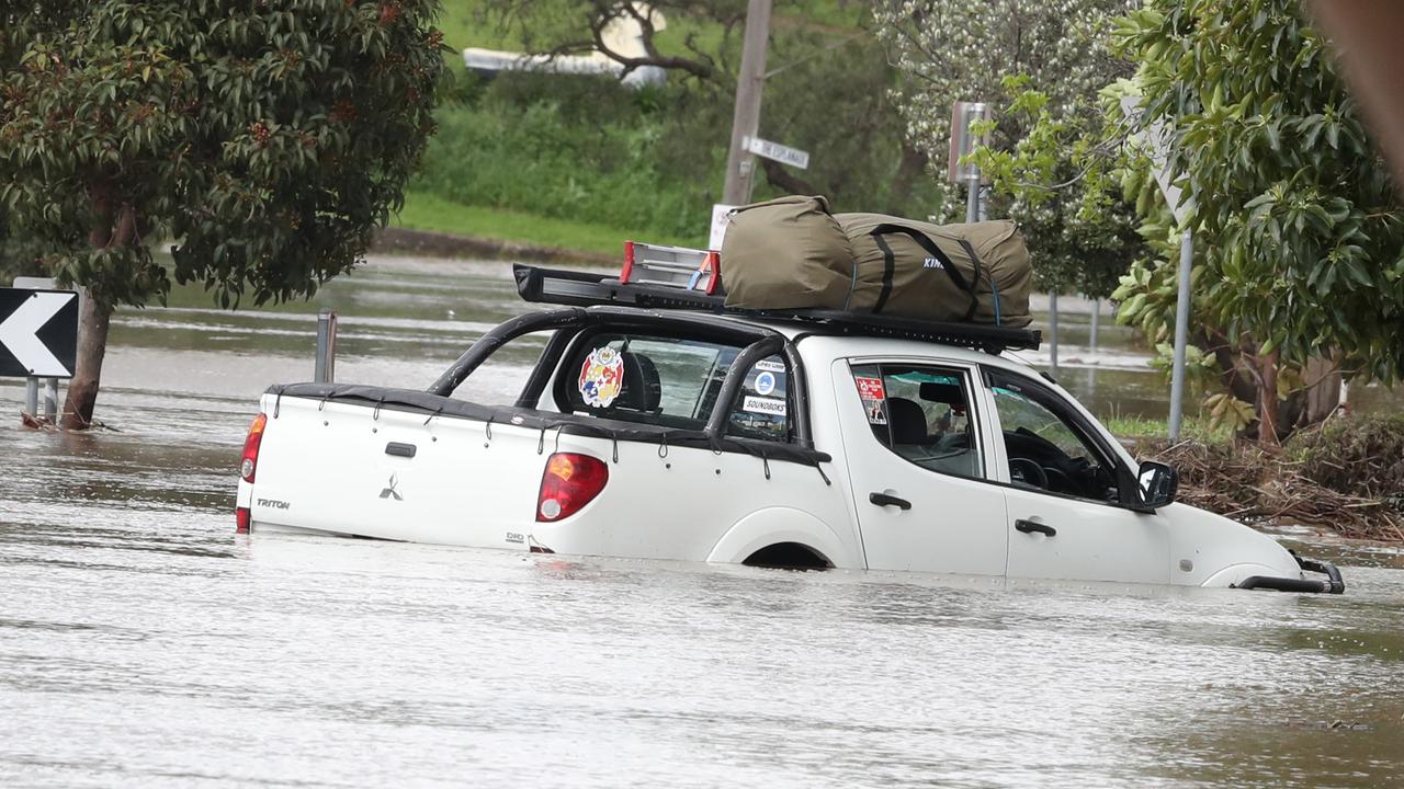 A car in Maribyrnong has been swept away in the sudden flooding. Picture: NCA NewsWire / David Crosling