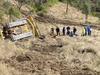 Man flown to hospital after bulldozer rolls down embankment