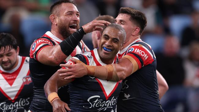 Jared Waerea-Hargreaves (left) and Victor Radley congratulate Jennings after he scored a try in the round seven NRL match against Melbourne Storm in April. Picture: Getty Images