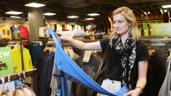 Customer Alex Gifford in a Kathmandu store in Brisbane. Picture: AAP