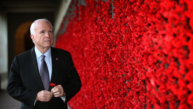 US senator John McCain at the Roll of Honour before attending the Last Post ceremony at the Australian War Memorial in Canberra. Picture: Kym Smith