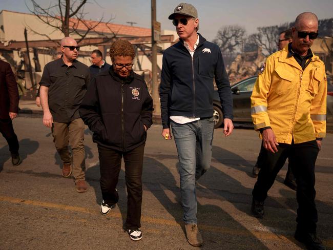 California Governor Gavin Newsom and Los Angeles Mayor Karen Bass tour the downtown business district of Pacific Palisades as the Palisades Fire continues to burn. Picture: Getty Images via AFP