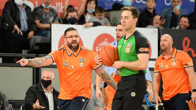 Taipans head coach Adam Forde talks to the referee during his side's NBL Blitz match against the JackJumpers at MyState Bank Arena. (Photo by Steve Bell/Getty Images)