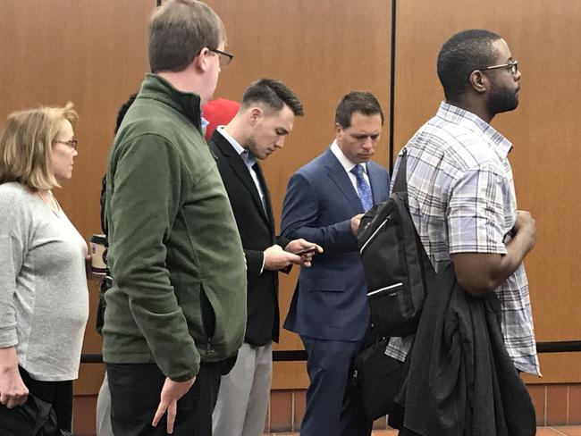 Don Damond, second from the right, pictured arriving at a Minneapolis court today. Picture: Sarah Blake/News Corp Australia