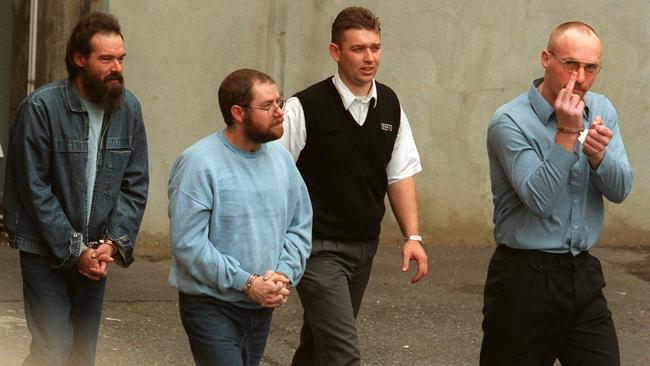 Robert Joe Wagner, right, in 2000, on his way into court with co-accused Mark Ray Haydon and John Justin Bunting.