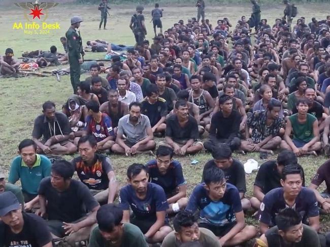 A screenshot of a video released by the Arakan Army (AA)’s information service on May 6, 2024, showing what it claims are captured Myanmar soldiers and their families in Buthidaung Township, Rakhine State, Myanmar.