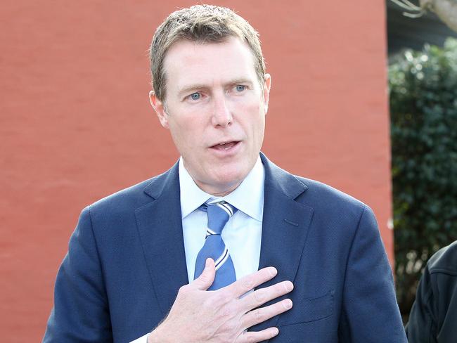 Federal Social Services Minister Christian Porter with Bass MHR Andrew Nikolic at St Michaels Association Special Needs School in Launceston.
