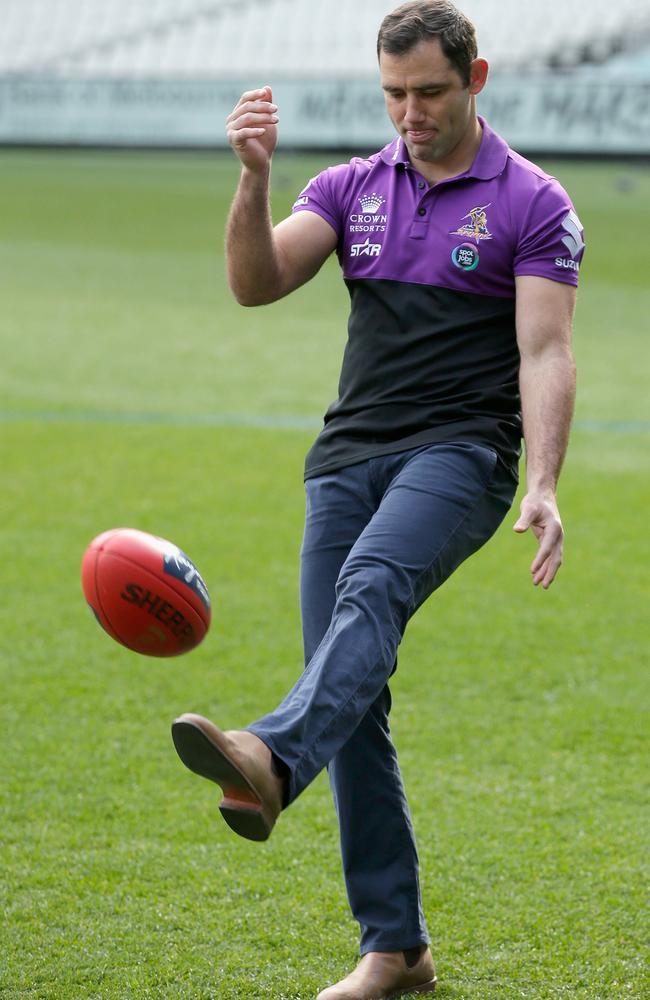 Cameron Smith displays his AFL skills at the MCG.