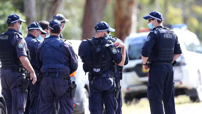 Police conduct a line search at the scene of the fatal shooting of David King. Picture: NCA NewsWire / Peter Lorimer.