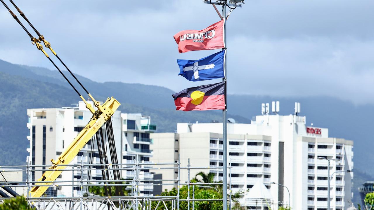 The CFMEU flag, the Southern Cross and the Aboriginal flag fly above the Cairns Tropical Enterprise Centre construction site, located on Sheridan Street near the Cairns Hospital. Picture: Brendan Radke.