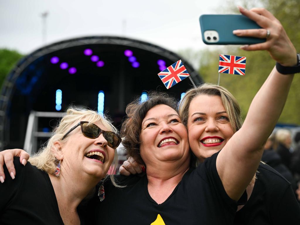 People take selfies at The Big Lunch at The Long Walk, at Windsor. Picture: Getty