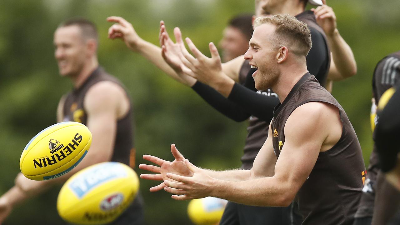 Tom Mitchell is all smiles ahead of his return to competitive football for the Hawks