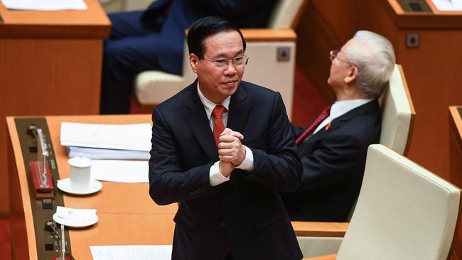 Vietnam's President Vo Van Thuong stands as he attends the National Assembly's summer session opening in Hanoi on May 22, 2023. (Photo by Nhac NGUYEN / AFP)