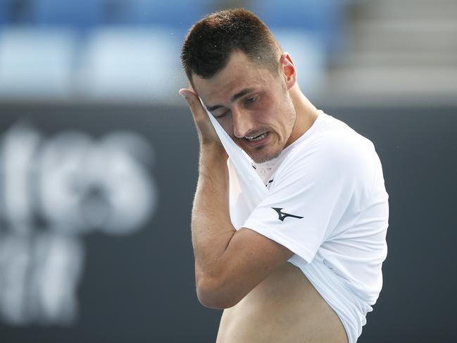 MELBOURNE, AUSTRALIA - JANUARY 14: Bernard Tomic of Australia reacts in his match against Denis Kudla of the USA during 2020 Australian Open Qualifying at Melbourne Park on January 14, 2020 in Melbourne, Australia. (Photo by Daniel Pockett/Getty Images)