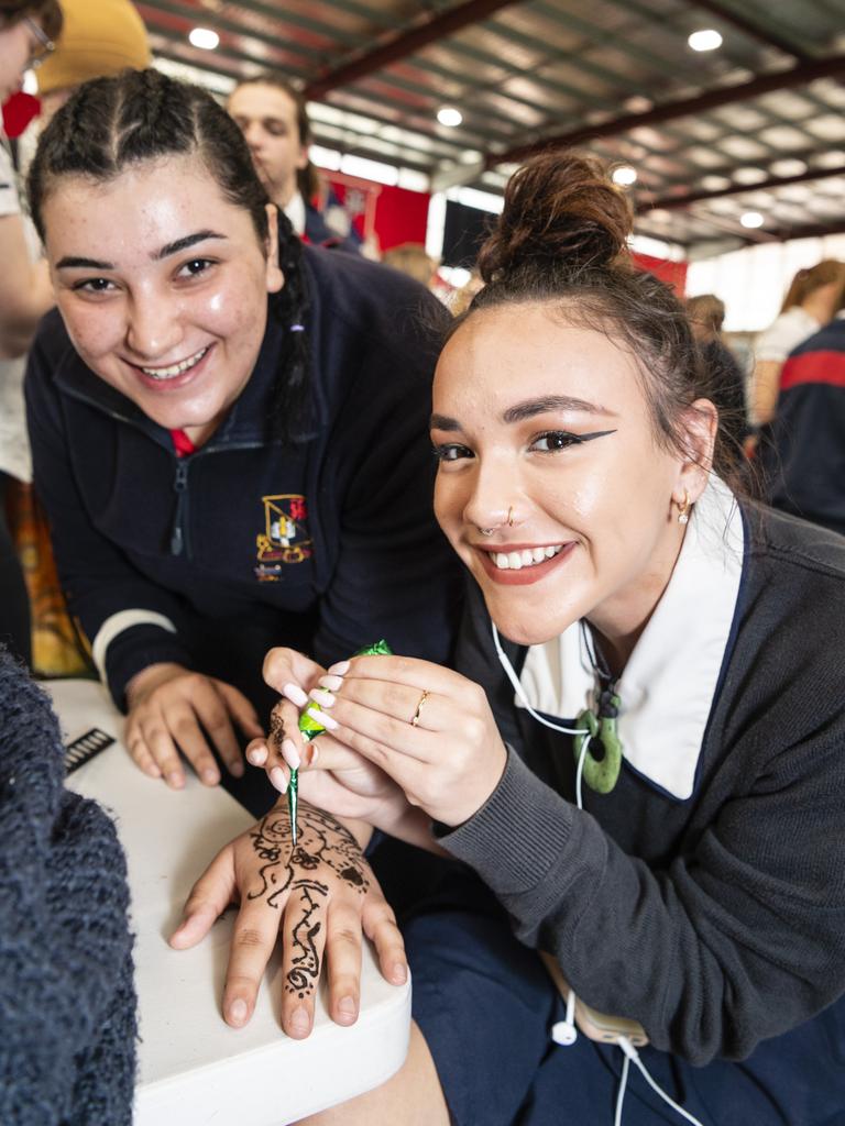 At the Amnesty stall are Toowoomba State High School students Shahrspan Khalaf (left) and Halle Knopfler at the TSHS Mental Health Expo, Friday, October 14, 2022. Picture: Kevin Farmer